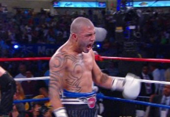 Image: Cotto stops Foreman in 9th