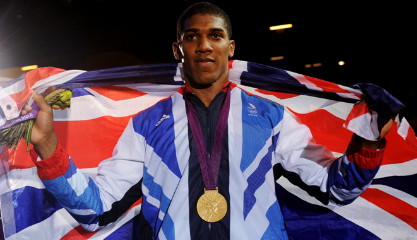 Image: Joshua wins gold medal on controversial decision over Cammarelle