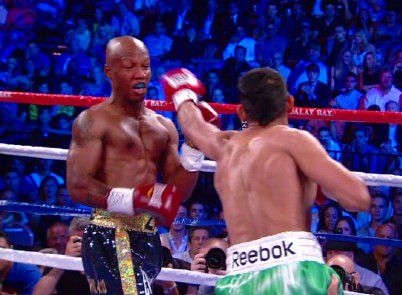 Image: Khan throws punch of lifetime to keep alive his hopes of facing Mayweather
