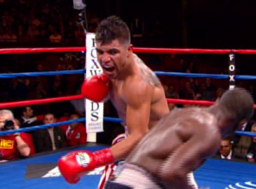 Amir Khan, Victor Ortiz boxing photo