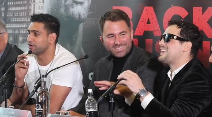 Image: Khan throws water into face of Lo Greco at press conference