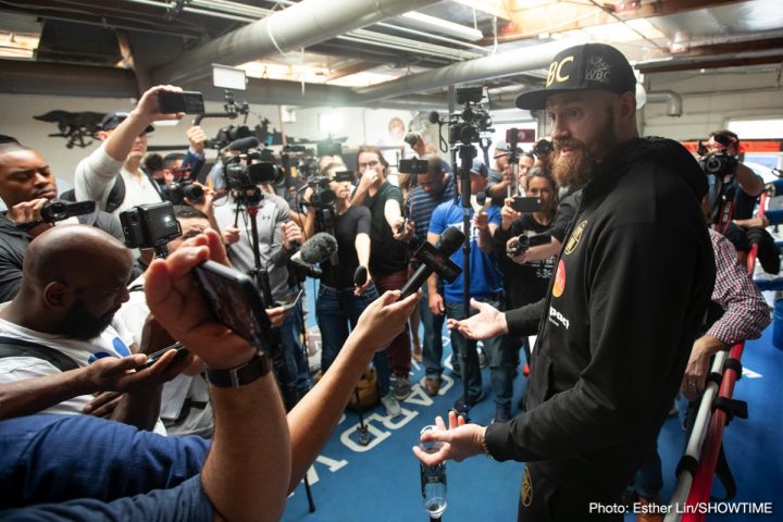 Image: Tyson Fury boots reporter for being a "hater" at media day workout