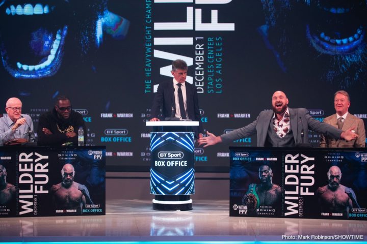Image: Deontay Wilder shoves Tyson Fury at London press conference