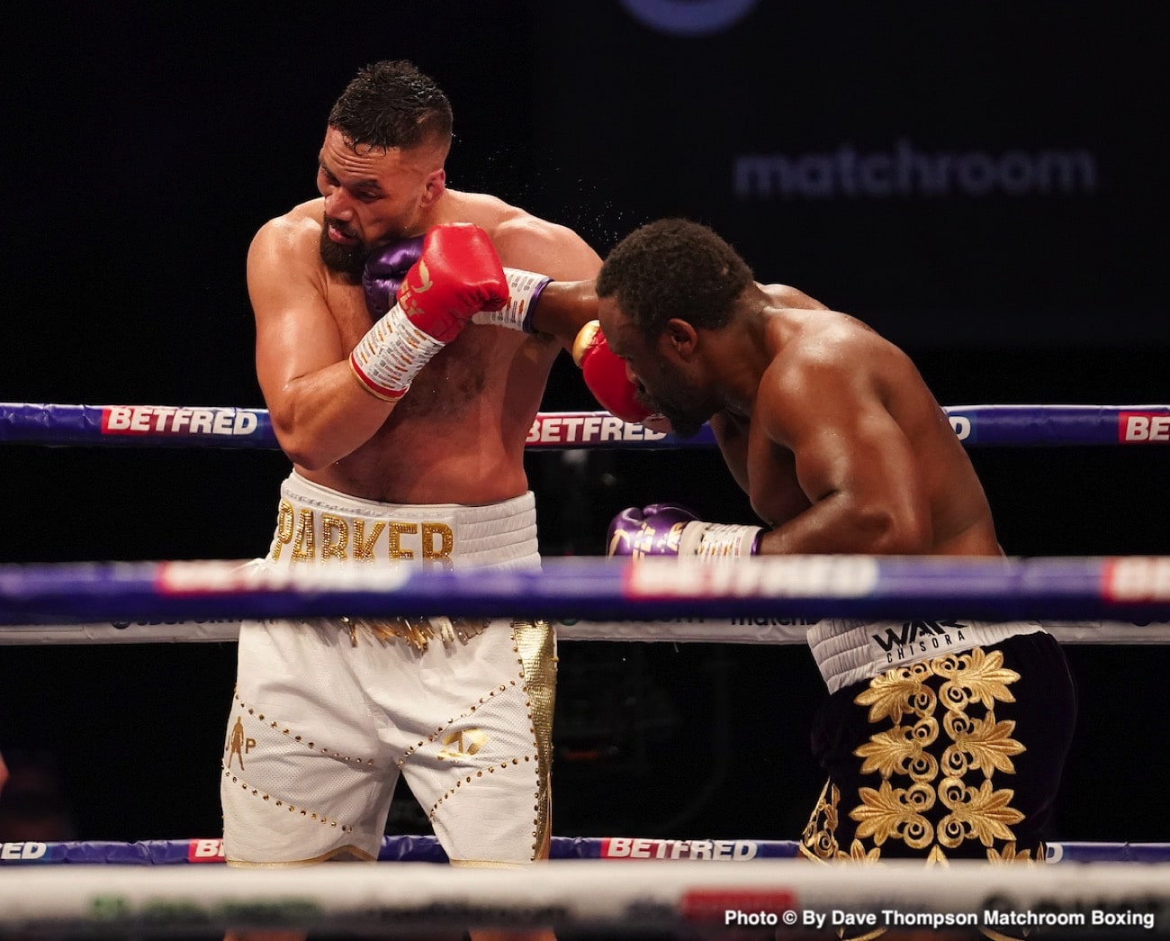 Derek Chisora, Anthony Joshua boxing photo