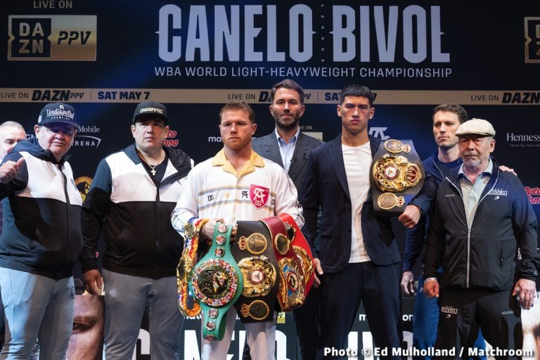 Image: Canelo showing off his four 168-lb titles with Bivol at final press conference
