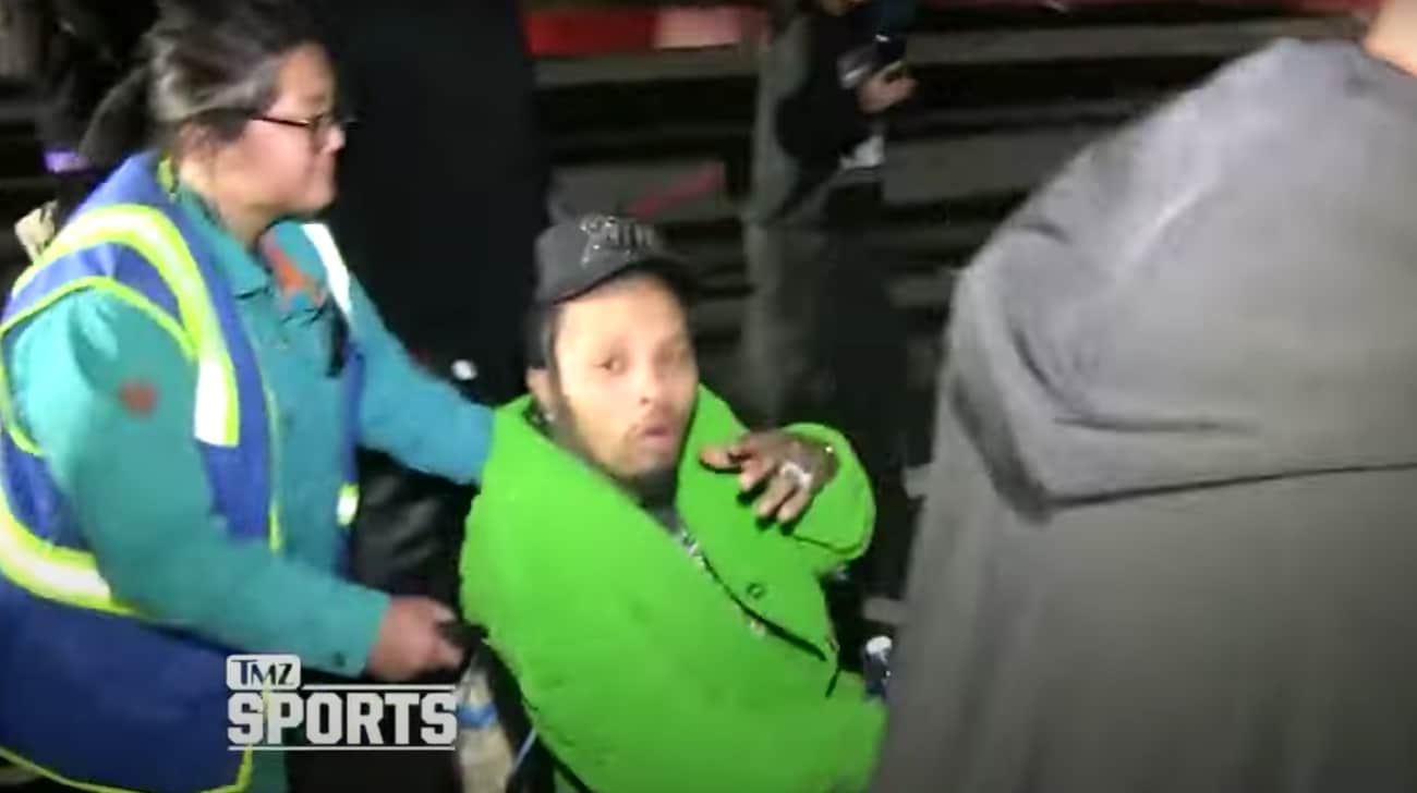 Image: Gervonta Davis in a wheelchair with ankle injury