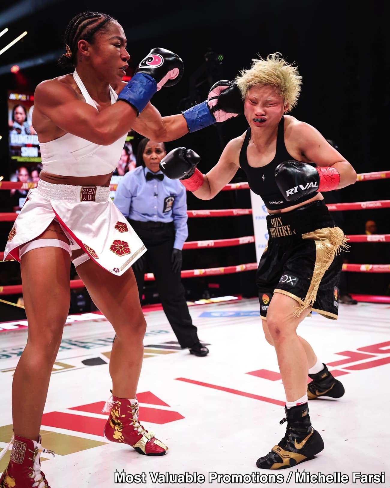 Image: Alycia Baumgardner Hurt but Beats Bo Mi Re Shin to Retain Titles