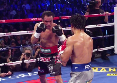 Image: Manny Pacquiao toppled by Juan Manuel Marquez