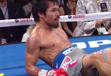 Image: Pacquiao was ahead on the scorecards when he was stopped by Marquez
